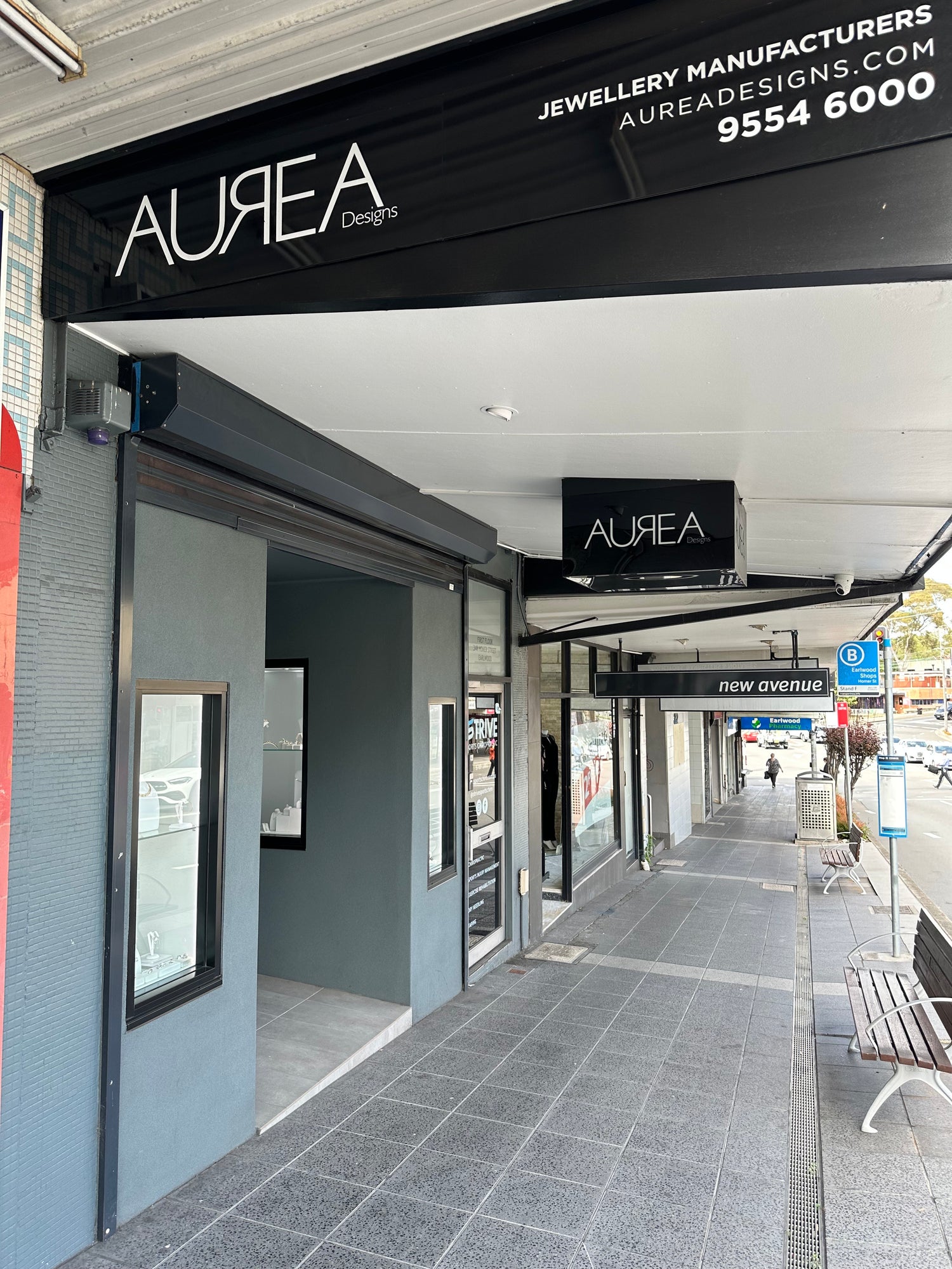 A close-up image of a well-maintained and neatly arranged entrance or facade of a building or property, showcasing its inviting features.