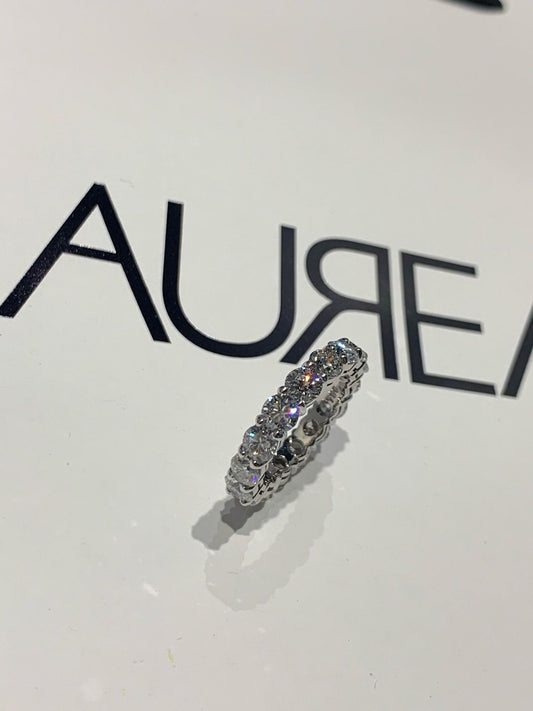 Who prefers the shared claw look like this diamond eternity band?
